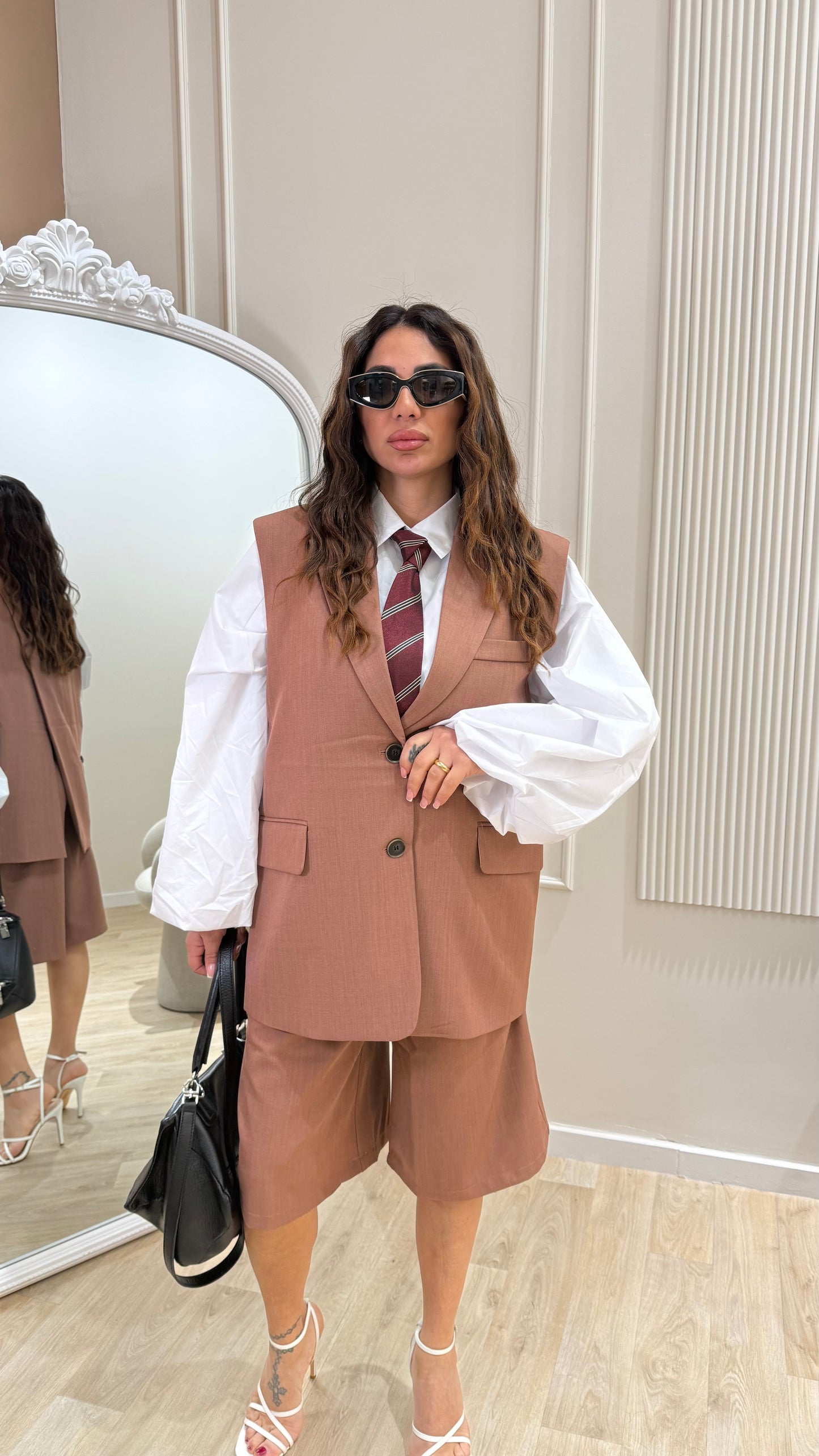 Set gilet e bermuda