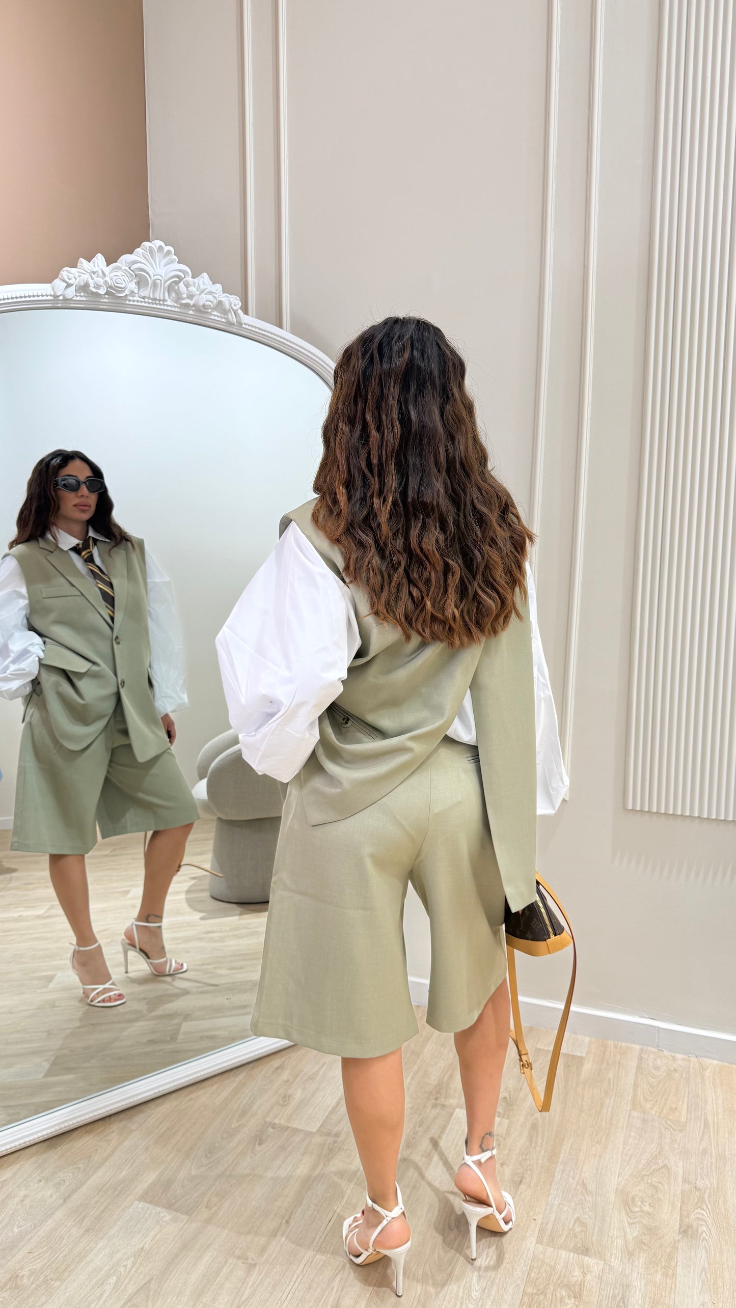 Set gilet e bermuda
